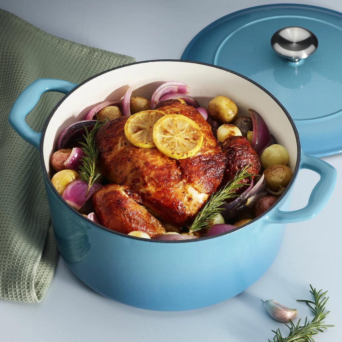 Tramontina 5.5 Qt Enameled Cast-Iron Series 1000 Covered Round Dutch Oven - Medium Blue 3 Tramontina 5.5 Qt Enameled Cast-Iron Series 1000 Covered Round Dutch Oven - Medium Blue