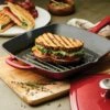 Tramontina 11 In Enameled Cast-Iron Series 1000 Grill Pan With Press - Gradated Red 1 Tramontina 11 In Enameled Cast-Iron Series 1000 Grill Pan With Press - Gradated Red -TRAMONTINA Sales 80131059PRM001G